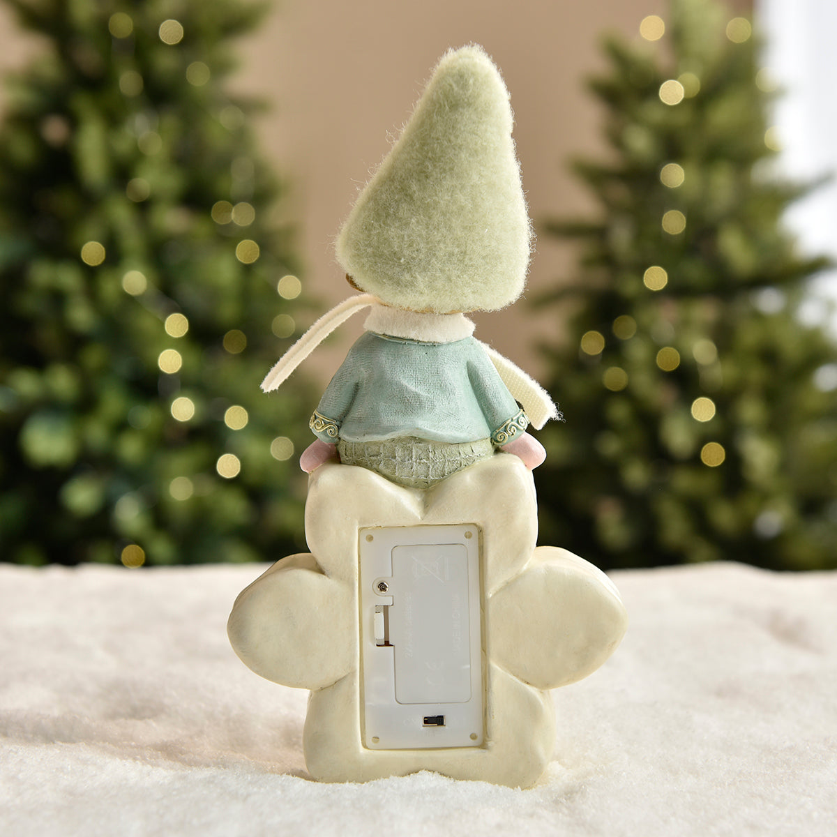 Figurine de Noël garçon avec bonnet vert sur flocon LED