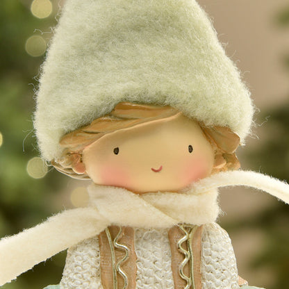 Figurine de Noël garçon avec bonnet vert sur flocon LED