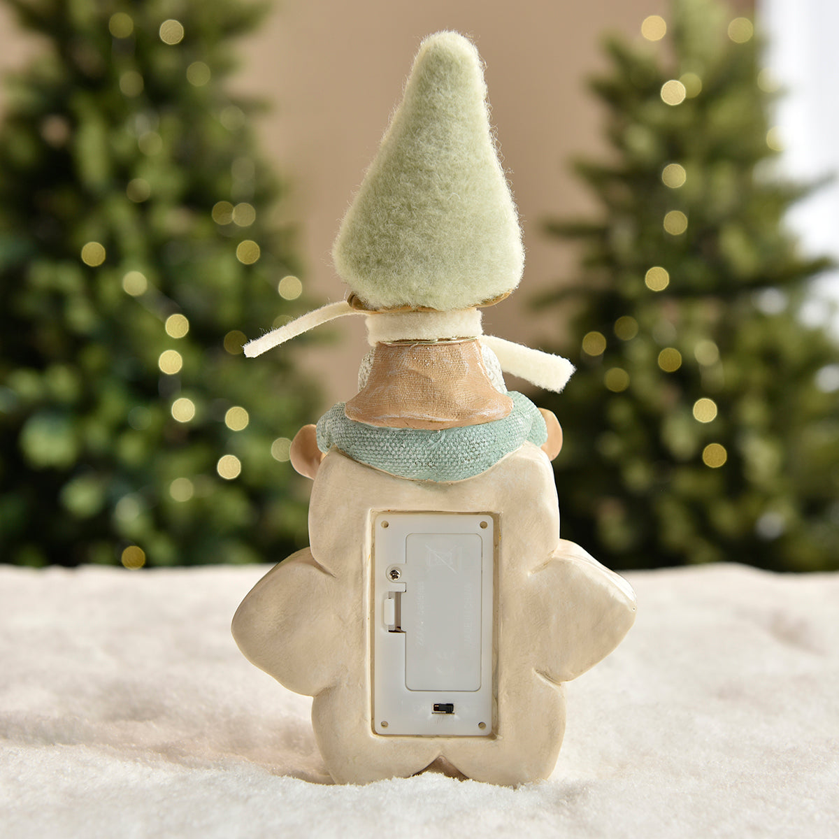 Figurine de Noël garçon avec bonnet vert sur flocon LED