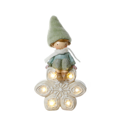 Figurine de Noël garçon avec bonnet vert sur flocon LED