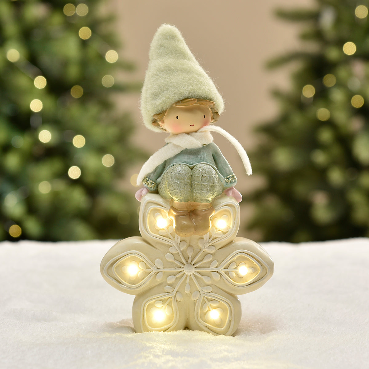 Figurine de Noël garçon avec bonnet vert sur flocon LED