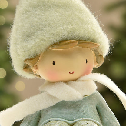 Figurine de Noël garçon avec bonnet vert sur flocon LED