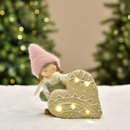 Figurine de Noël Fille à bonnet rose sur Coeur LED