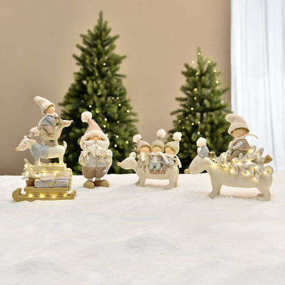 Figurine de Noël 3 Enfants sur Renne Pastel